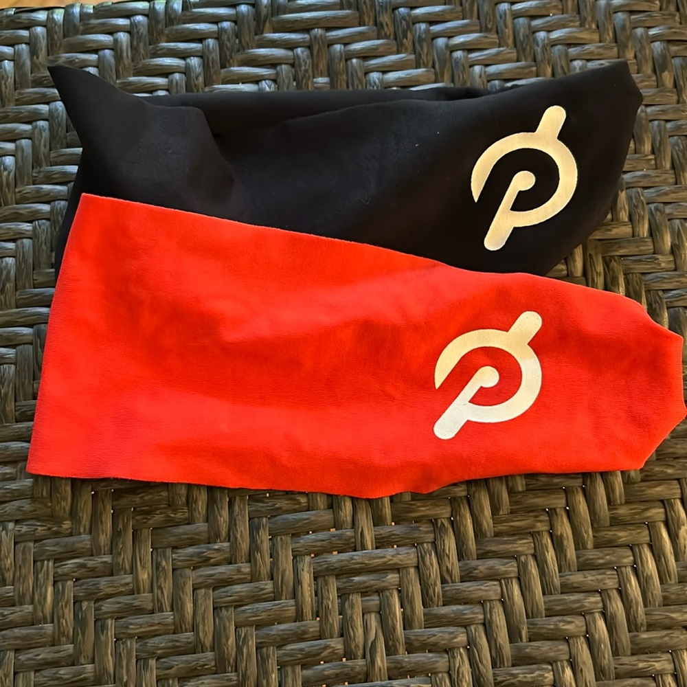 2 Peloton headbands (black and orange/red)